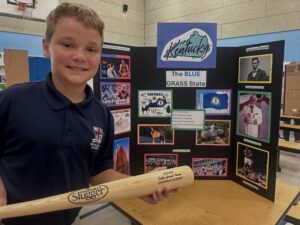 Student presenting academic work and developing confidence