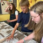 Students engaged in hands-on learning at Royalmont Academy