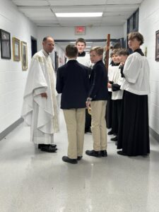 Royalmont students serving at Mass and growing through Catholic mentorship.