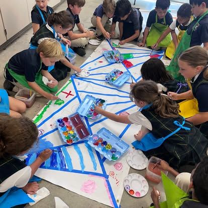 Royalmont students using teamwork skills during a collaborative school art project